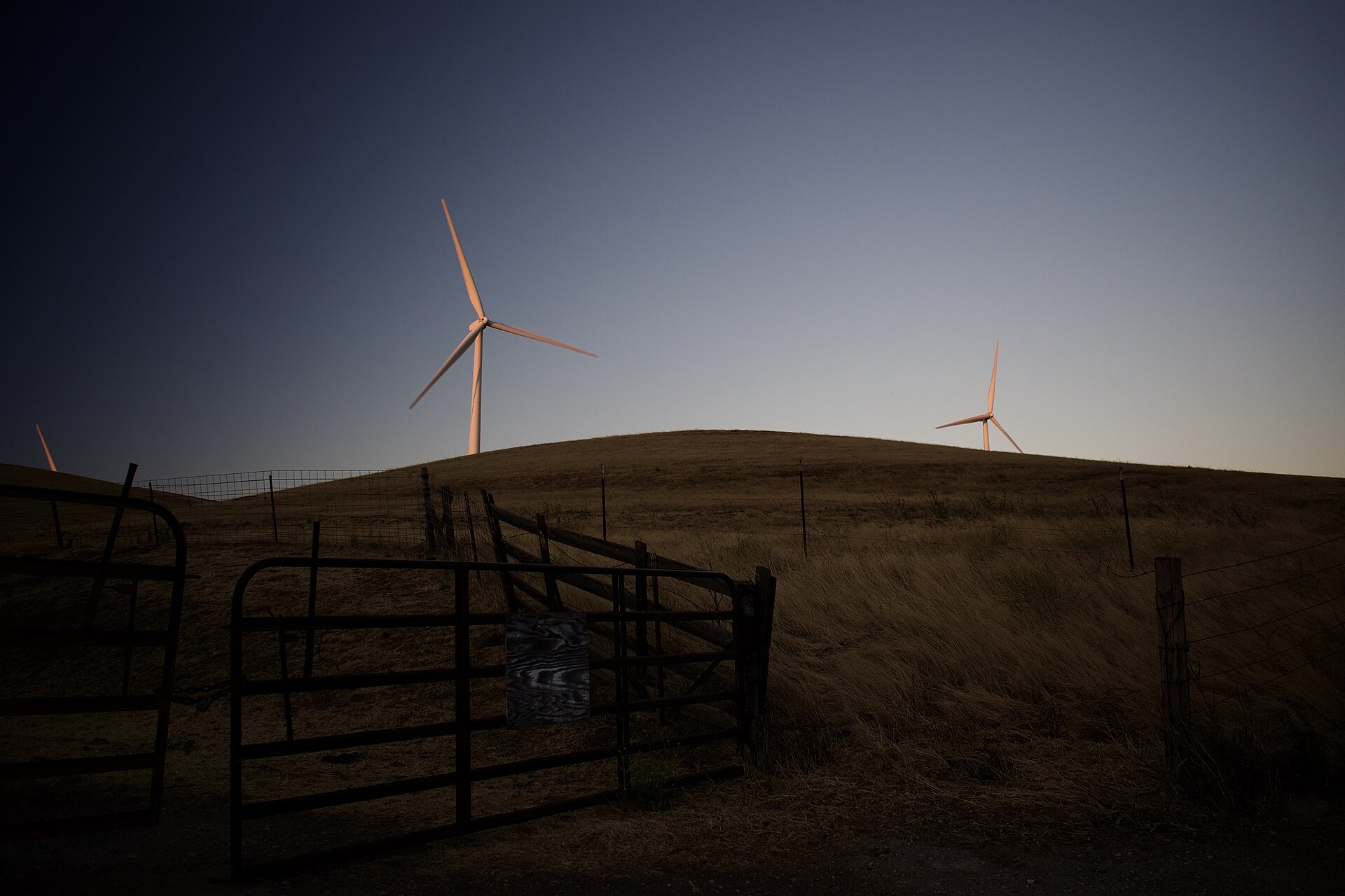 Views of windmills and pasture land at sunset at Altamont Pass Wind Farm
